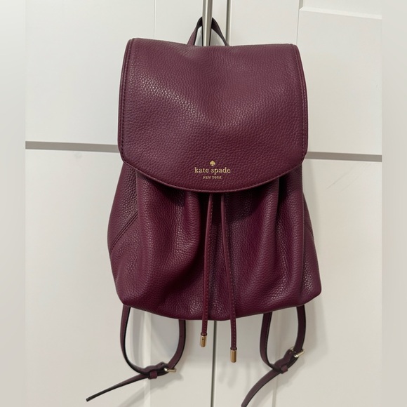 kate spade Handbags - Kate Spade Backpack. Color Red/Purple